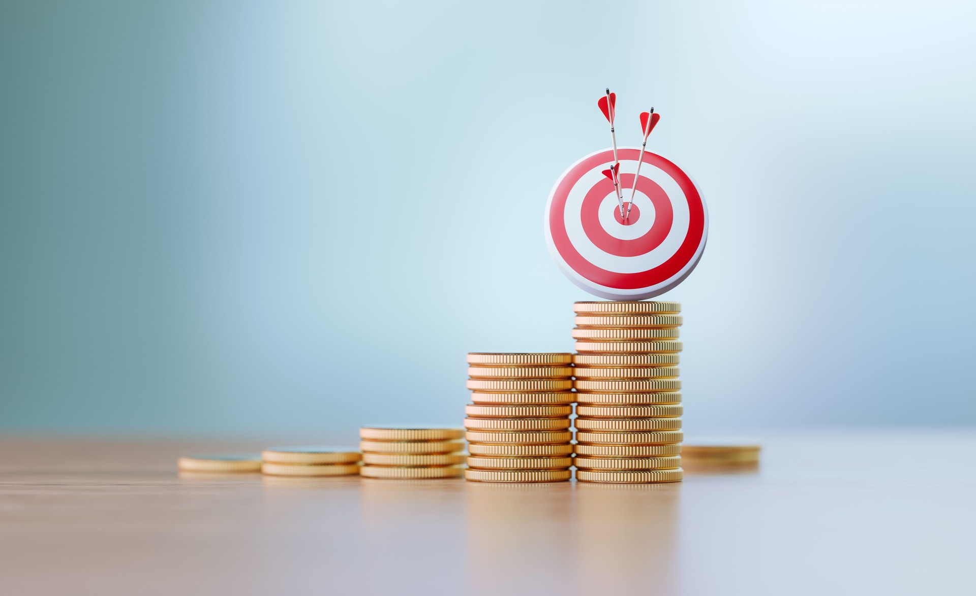 Success And Accuracy Concept - Red Dartboard and Arrows Sitting Before Defocused Background